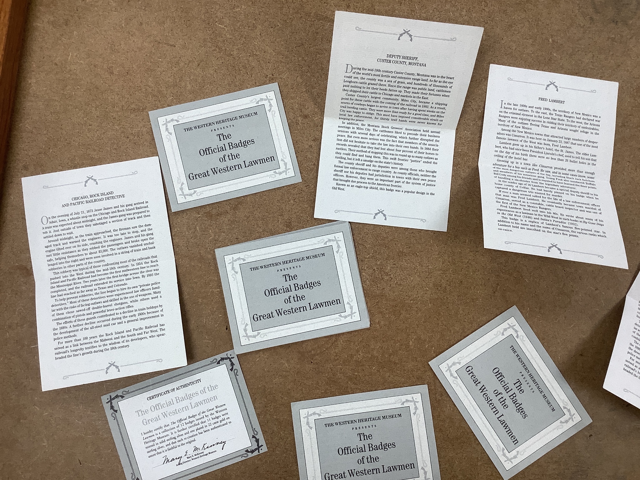 The Official Badges of Great Western Lawmen, cased set of sterling silver/silver gilt badges with certificates of authenticity.